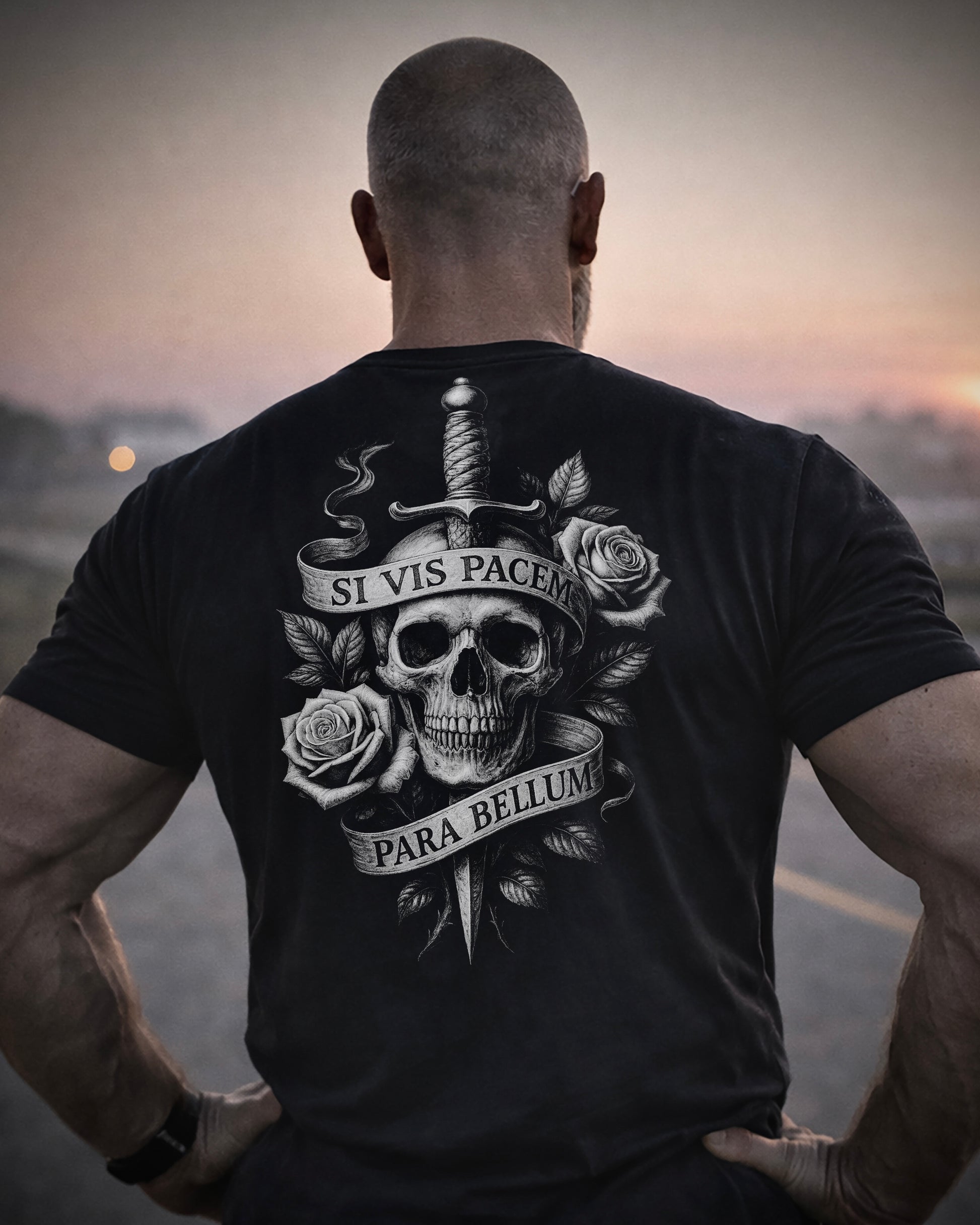 Back view of man wearing black Achilles T-shirt printed with Si vis pacem para bellum on back