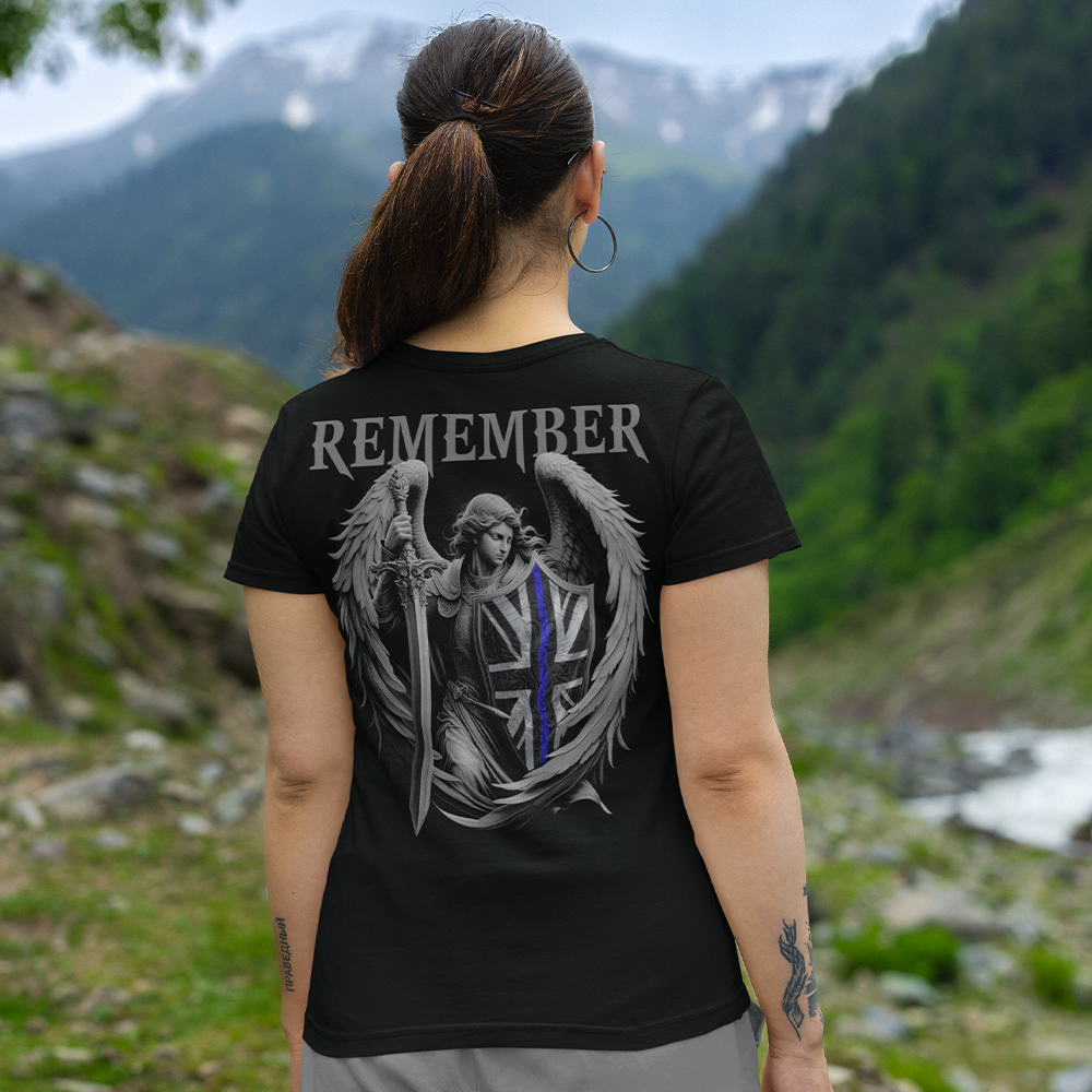 Back view of woman wearing black short sleeve unisex fit original T-Shirt by Achilles Tactical Clothing Brand Rememeber Thin Blue Line design