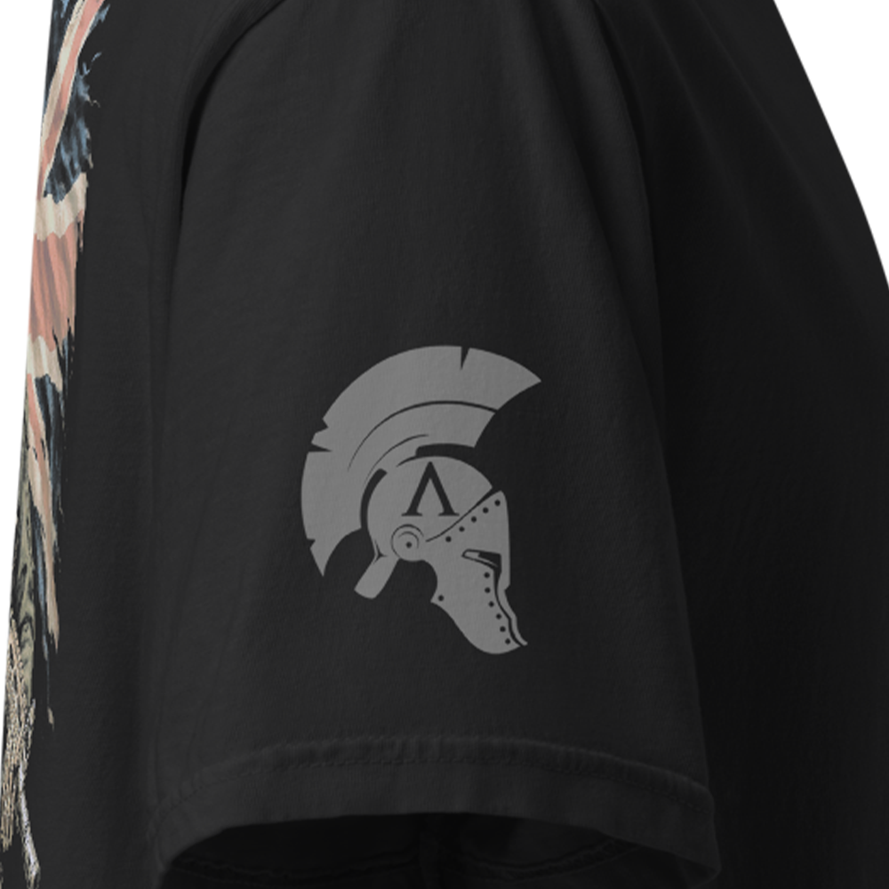 Close up of right sleeve of Black short sleeve unisex fit classic cotton T-Shirt by Achilles Tactical Clothing Brand printed with Large This Flag We Defend design across back