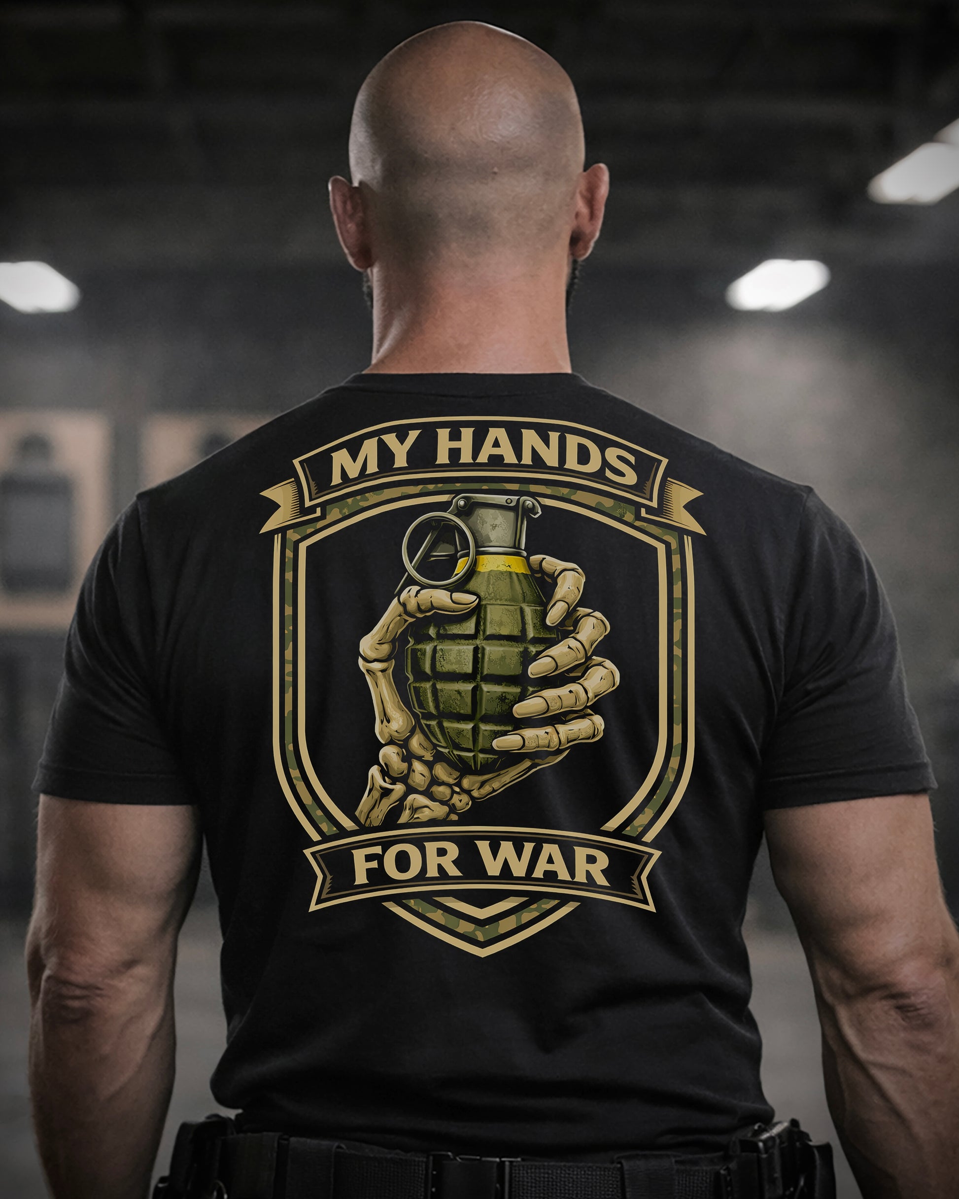 Back view of man wearing black Achilles T-shirt printed with My Hands For War logo on back
