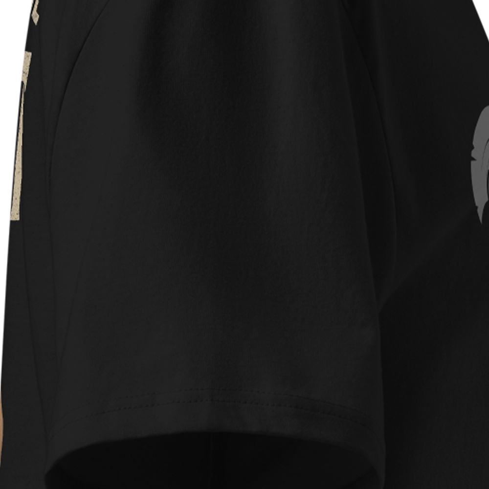 Black T-Shirt sleeve with a logo on the sleeve against a white background