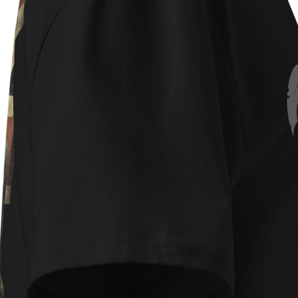 Black t-shirt with a small graphic on the sleeve