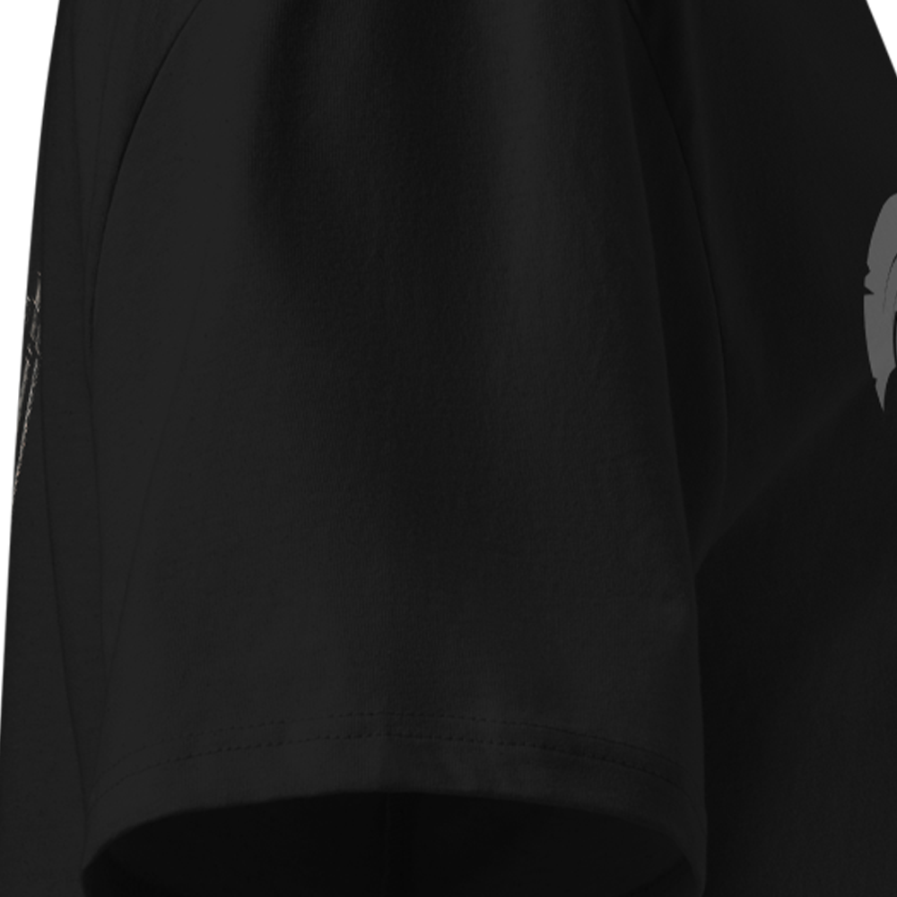Black T-Shirt sleeve with a logo on the sleeve against a white background