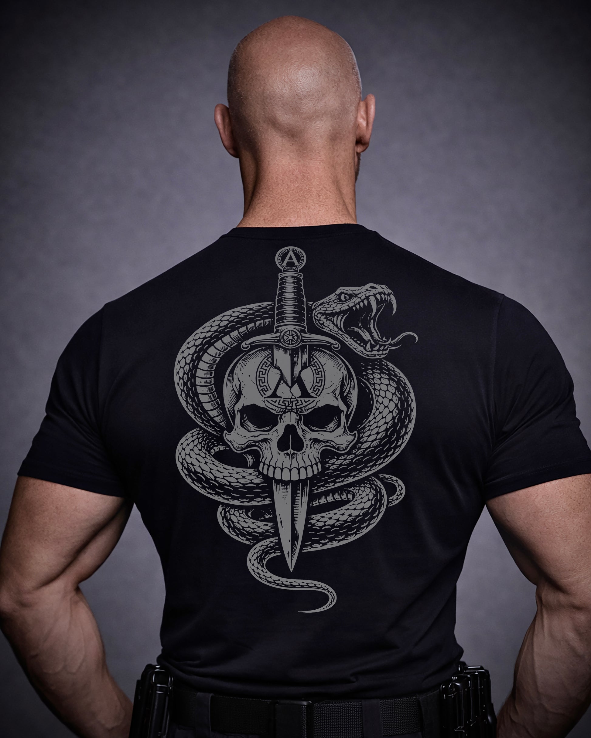 Back view of man wearing black Achilles T-shirt printed with Large Venom logo on back